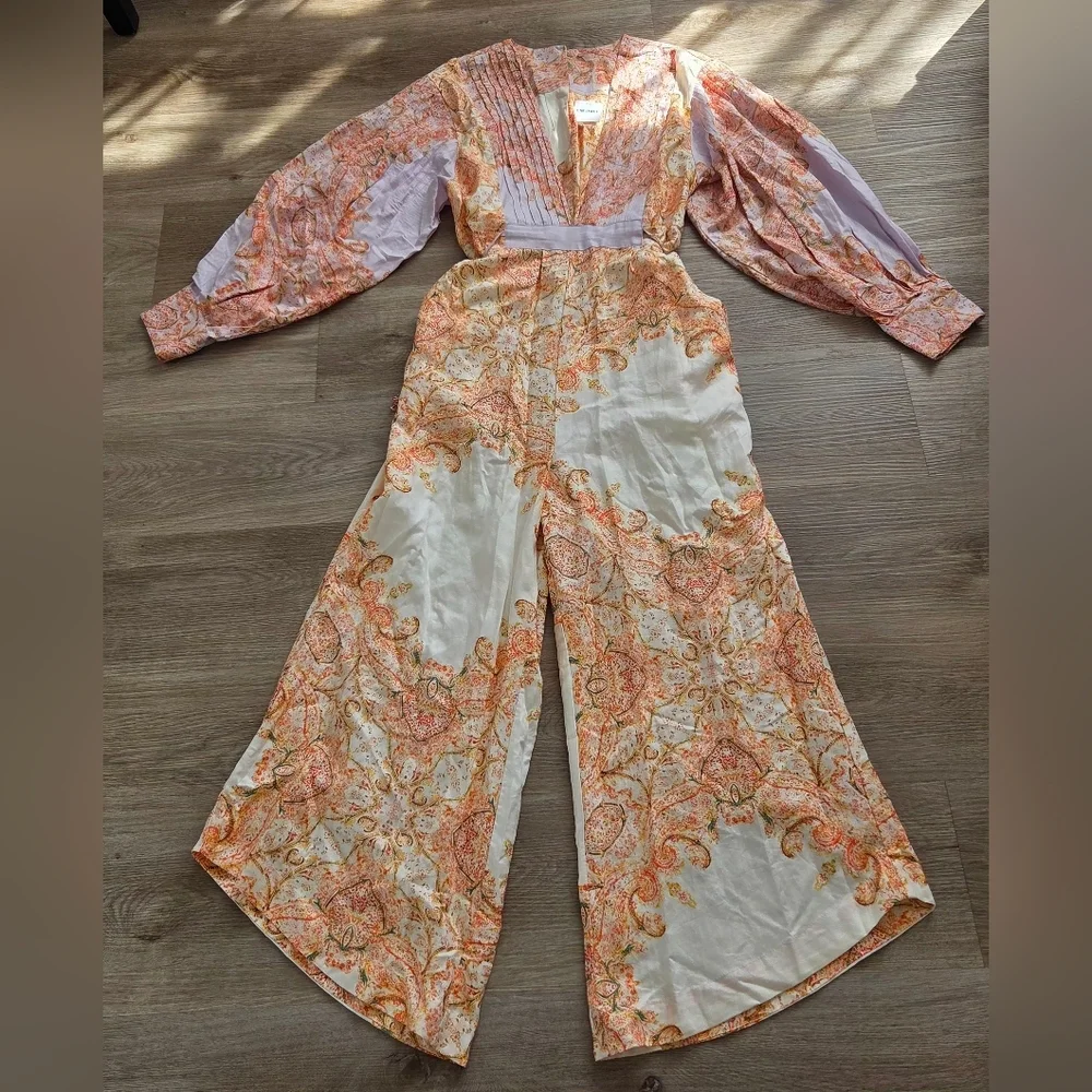 This is a Free People Blooming Fields wide-legged jumpsuit with a paisley bohemi - Picture 3 of 10